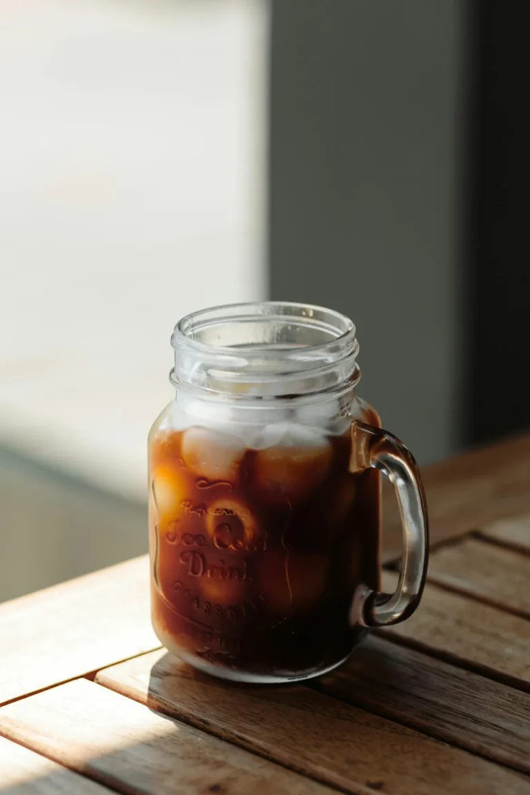 Cold brew coffee over ice in a mason jar